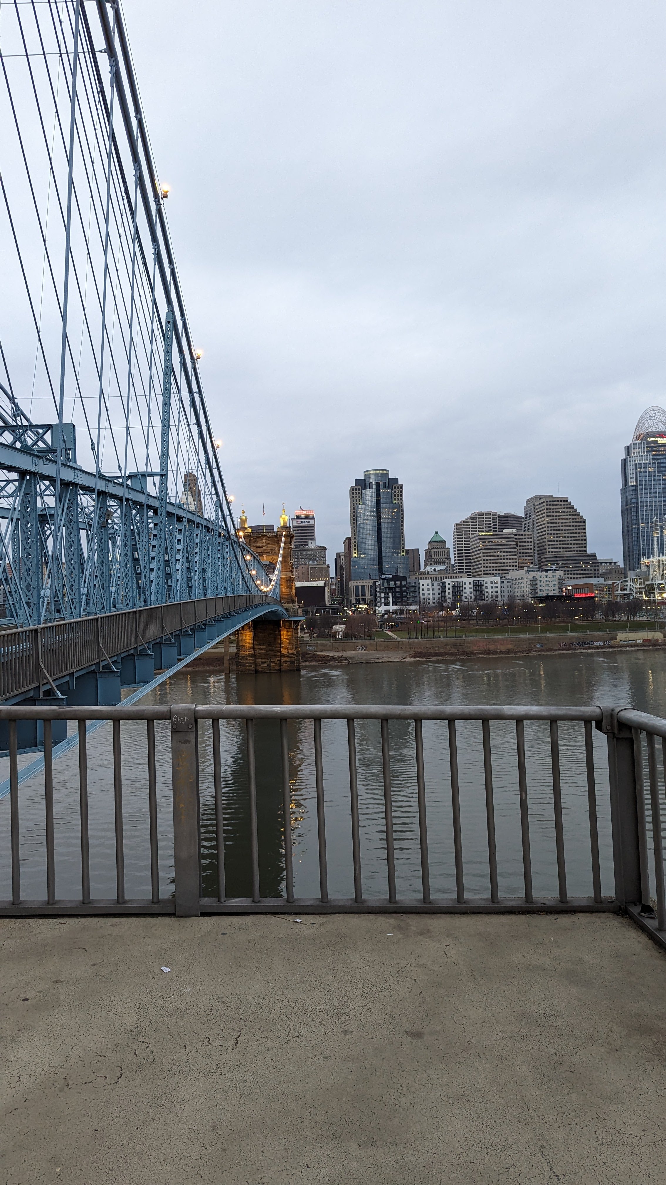 Looking north on the covington side of the Ohio river on the Robling Bridge, looking at the cincinnati skyline